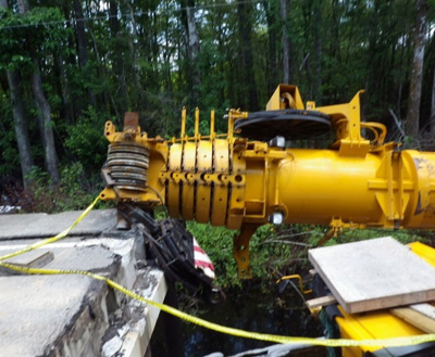 Export Logistics & Shipping, Inc. Liebherr LTM1250 crane is capsized